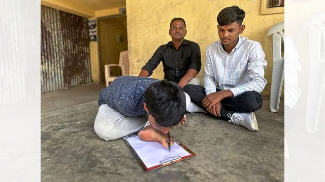 17-year-old Gaus Shaikh, born with no arms, who wrote his HSC examination paper with his toes and scored 78 percent marks in science.