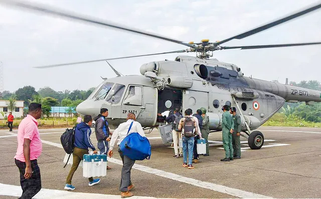 Polling officials leave for poll duty from left-wing extremism-affected areas of Dantewada ahead of the first phase of voting for Chhattisgarh Assembly elections