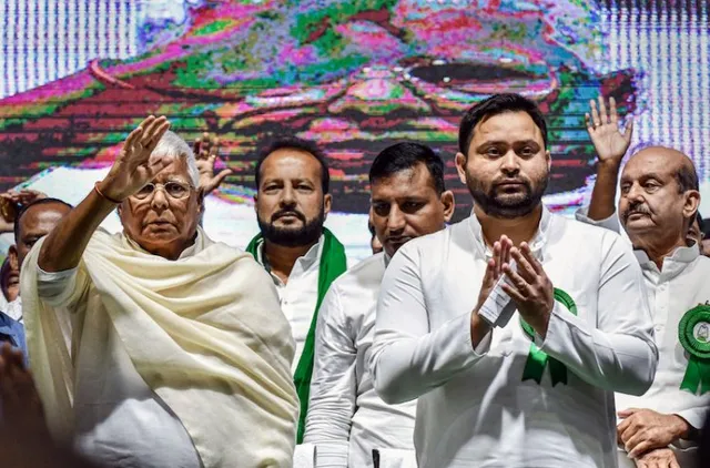 Rashtriya Janata Dal (RJD) President Lalu Prasad Yadav with Bihar Deputy Chief Minister and party leader Tejashwi Yadav during RJD's National Executive Meeting, at Talkatora Stadium in New Delhi, Monday