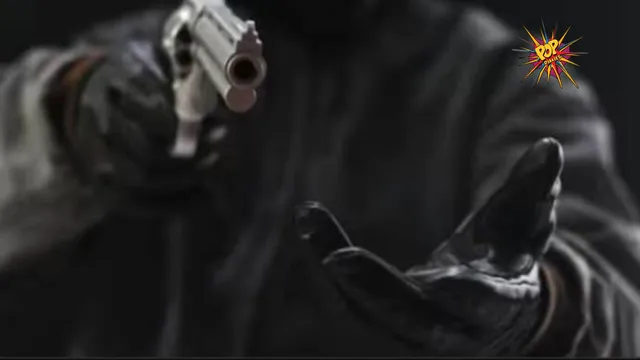 at gunpoint