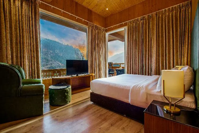 Spacious rooms with panoramic views of the Himalayas at Palchan Hotel & Spa, a member of Radisson Individuals Retreats