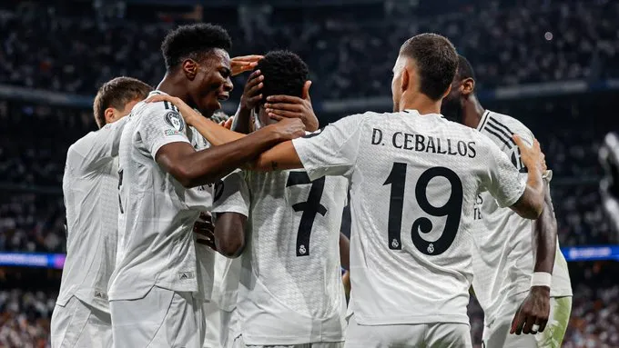 Madrid Players celebrate another goal against Dortmund in the Champions League- Sportz Point.com