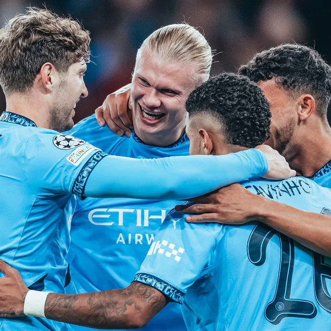 Man city players celebrate a goal against Slavia Praha- Sportz Point.com