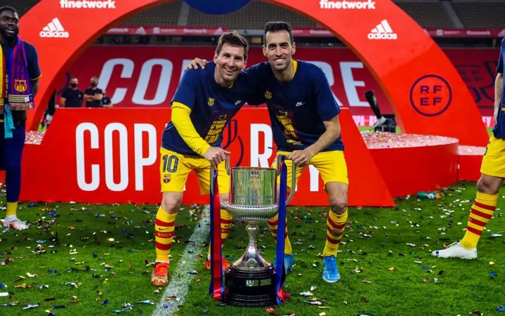 Football Facts: Lionel Messi and Sergio Busquets celebrating the Copa del Rey victory