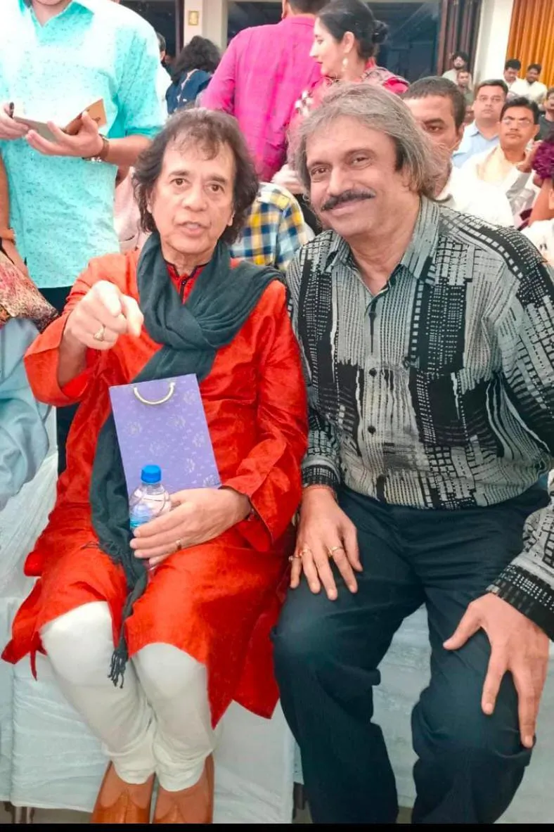 Ustad Zakir Hussain at a concert with sr film journalist Chaitanya Padukone