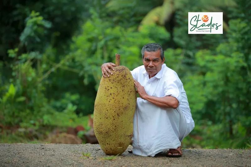 Thomas with one of the heaviest jackfruits on his farm. Pic: Chandhini R