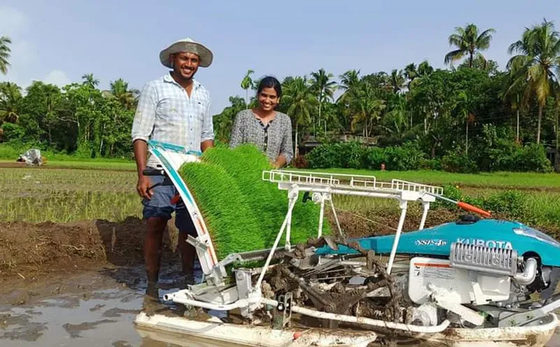Pavithra and mohammed working on the farm