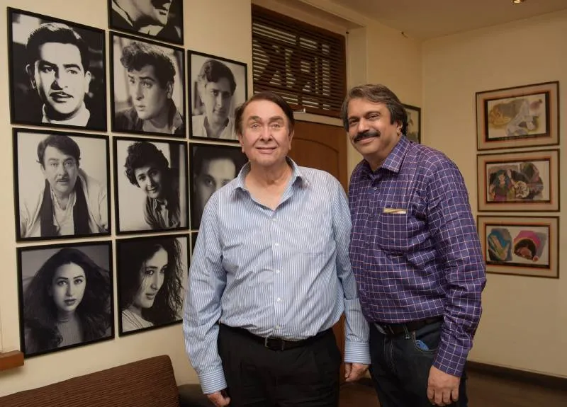 Randhir Kapoor in his cabin at R K Studios with sr.film journalist Chaitanya Padukone