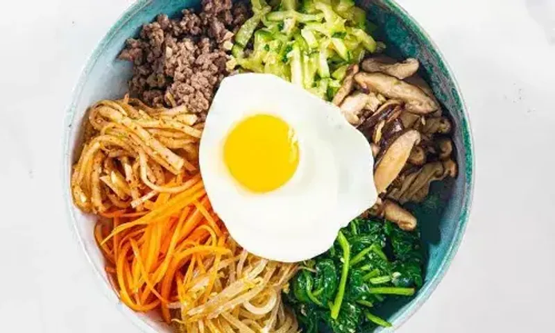 Bibimbap Recipe: A Korean rice meal prepared with mixed vegetables