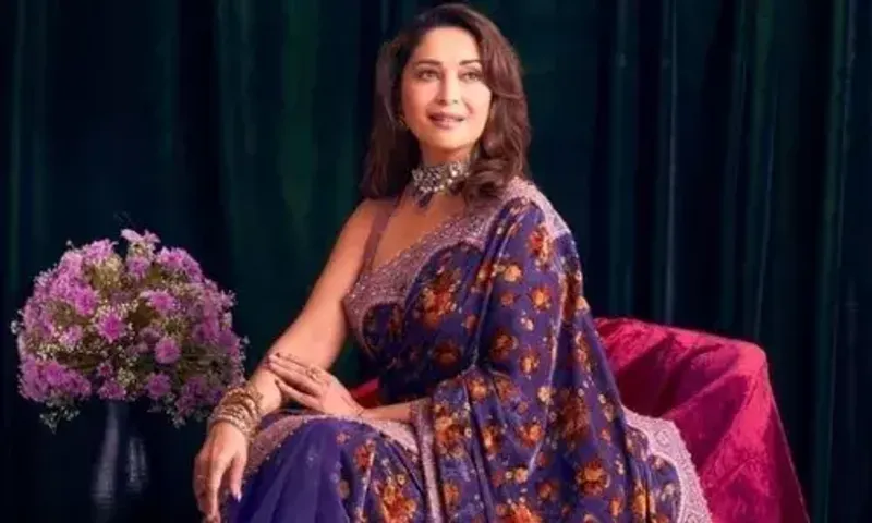 Madhuri Dixit in a 1 lakh jamuni velvet saree proving her the most beautiful woman on the planet