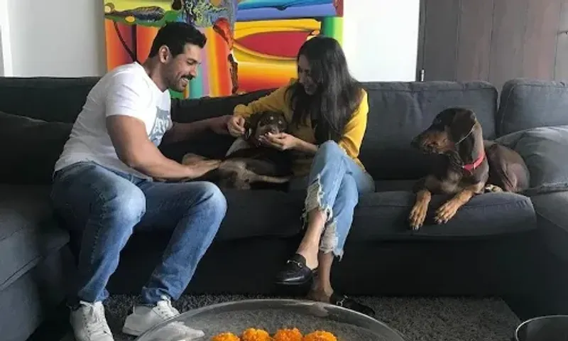 On his 49th birthday, John Abraham shares adorable photos with his wife Priya and their dogs