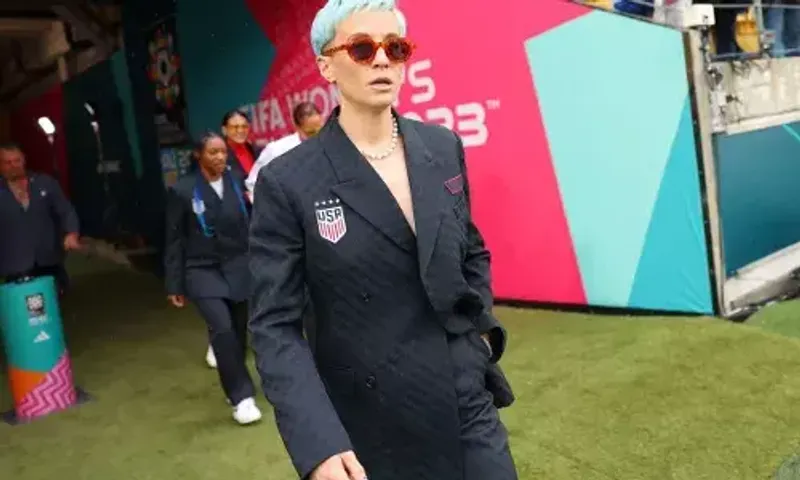 Megan Rapinoe: Put a Nike's World Cup gender neutral fashion line by going shirt free under a blazer