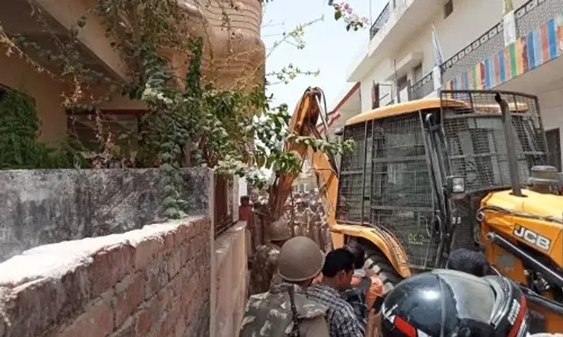 Amid huge security, bulldozers demolish home of Prayagraj violence accused in UP