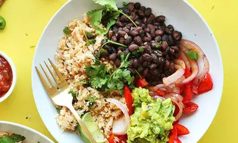 Vegan Mexican Bowl Recipe: Paired with protein-packed black beans, this bowl becomes a substantial and satiating meal