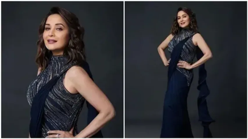 Madhuri Dixit, in a midnight swirl saree, looks super stunning