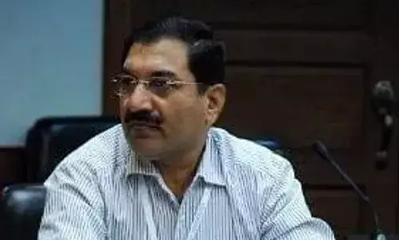 Gandhinagar police arrest retired IAS officer S K Langa