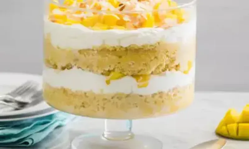 Mango Trifle Recipe: Featuring fresh mangoes and strawberries, this Continental dessert recipe would be surely loved by everyone