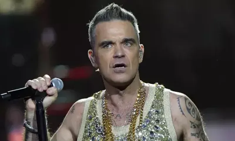 Robbie Williams fan dies after falling down six rows of seats