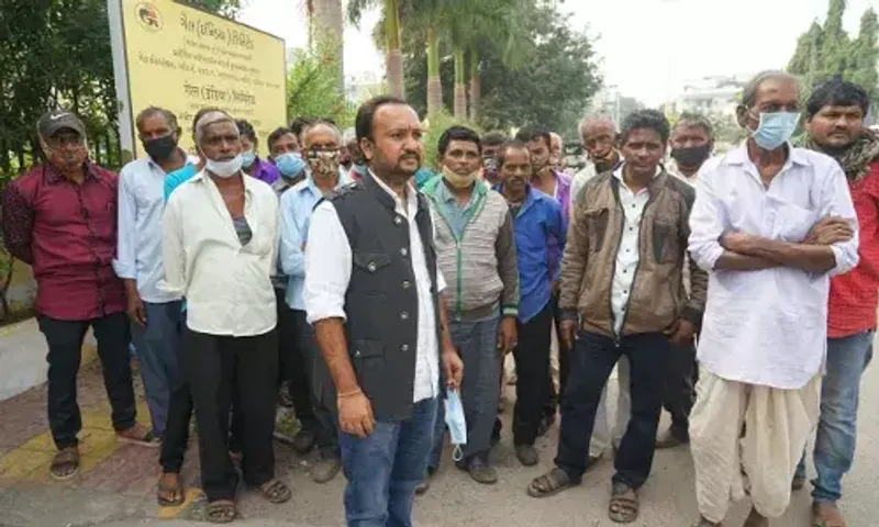 Padra MLA with farmers form Chokari village protest outside Gail office for non payment of proper compensation