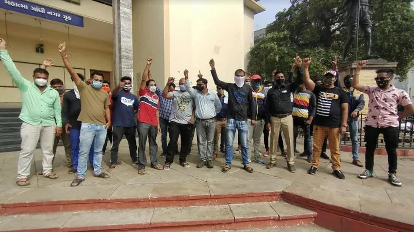 DJ Sound System and Light Operators staged protest at Gandhinagar Gruh