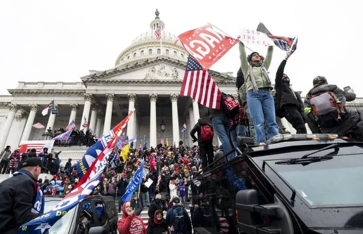 Violence erupts as Donald Trump supporters storm US capitol, 1 dead