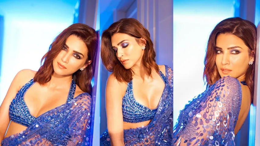 Kriti Sanon Photos: कृति सेनन पर चढ़ा बोल्डनेस का रंग, ब्लू साड़ी पहन खींचा ध्यान