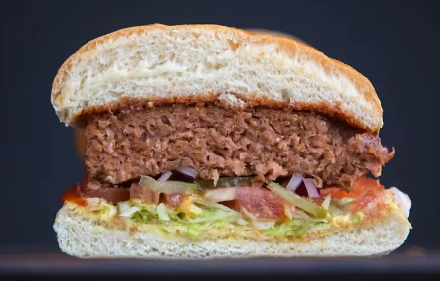Plant-based burgers made with more lentil or pea protein tend to look more brown and meatlike. Bloomberg Creative/Bloomberg Creative Photos via Getty Images
