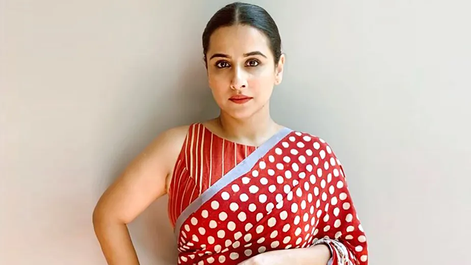 Vidya Balan paired her red and white polka dot sari with an interesting  sleeveless striped blouse | VOGUE India
