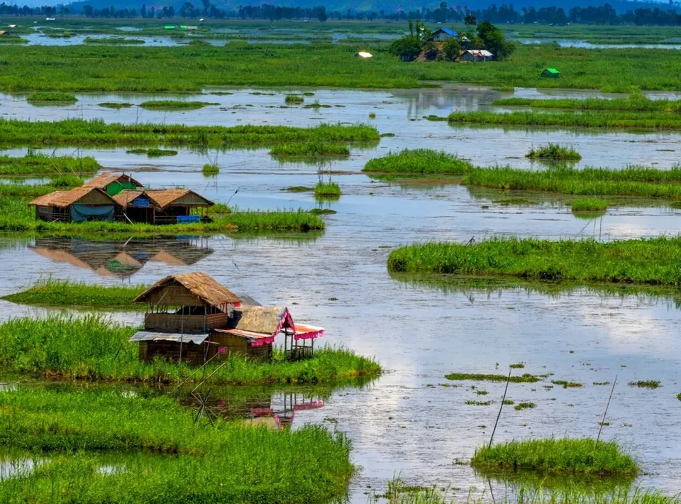Bamboo huts (phumsang) built on the floating islands of Loktak Lake in Moirang, Manipur