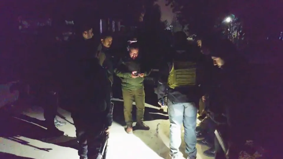 Security personnel conduct investigation after two persons from Uttar Pradesh were shot at by militants, in Jammu and Kashmir's Budgam district, Friday, Nov 1, 2024.