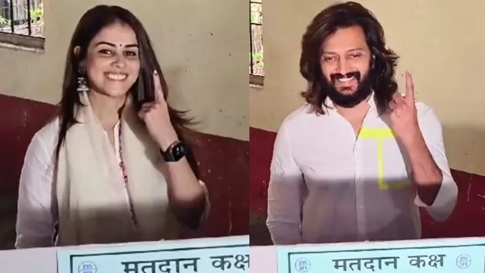 Actor Genelia shows her finger marked with indelible ink after casting vote during the Maharashtra Assembly elections, in Latur district, Wednesday, Nov. 20, 2024