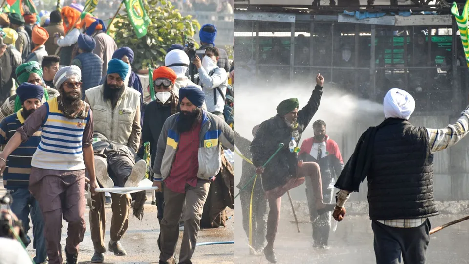An injured farmer being carried away after security personnel fired tear gas shells to disperse agitating farmers at Shambhu border, in Patiala district, Punjab, Saturday, Dec. 14, 2024.