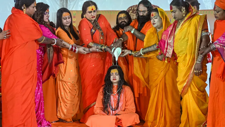 Kinnar Akhara's Acharya Mahamandaleshwar Laxmi Narayan Tripathi and others perform rituals as former actor Mamta Kulkarni is being consecrated as a mahamandaleshwar during the ongoing Maha Kumbh Mela 2025 on Friday, Jan. 24, 2025.