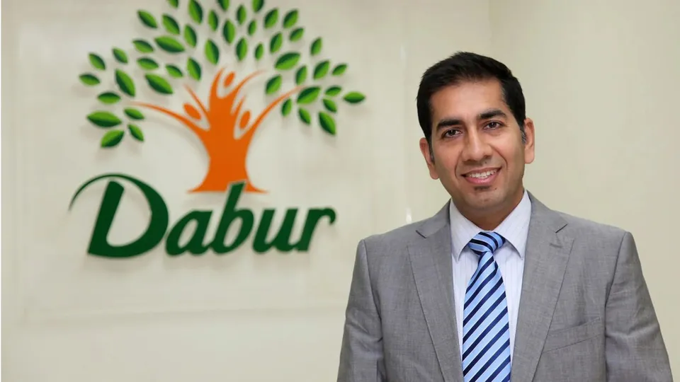Dabur Group Chairman Malhotra image