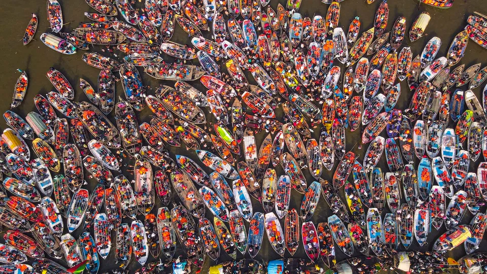 A drone shot of devotees taking a boat ride during ongoing Mahakumbh Mela at the Sangam in Prayagraj on Monday, Feb. 17, 2025.
