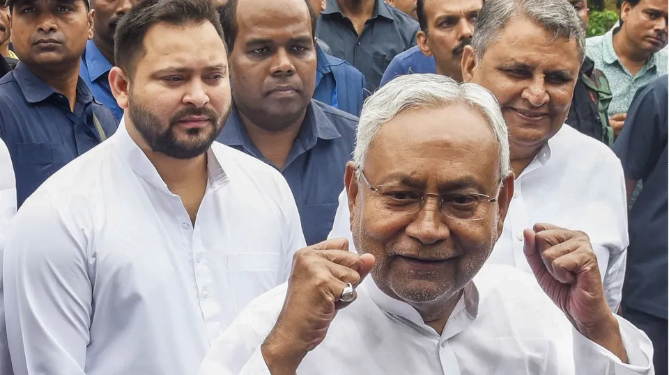 Bihar Chief Minister Nitish Kumar with Deputy Chief Minister Tejashwi Yadav during celebrations of the birth anniversary of Bharatiya Jana Sangh leader Deendayal Upadhyaya, in Patna