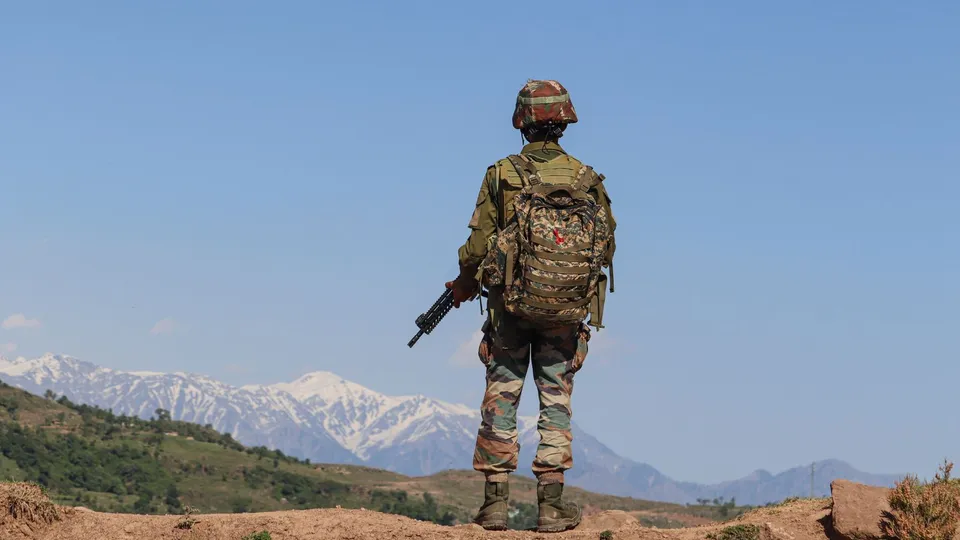 An Indian Army soldier stands guard near the Line of Control (LoC), in Poonch district of Jammu & Kashmir, Tuesday, May 14, 2024