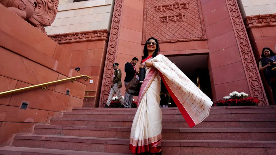 TMC MP Mahua Moitra arrives during the Winter session of Parliament, in New Delhi, Friday, Dec. 8, 2023.