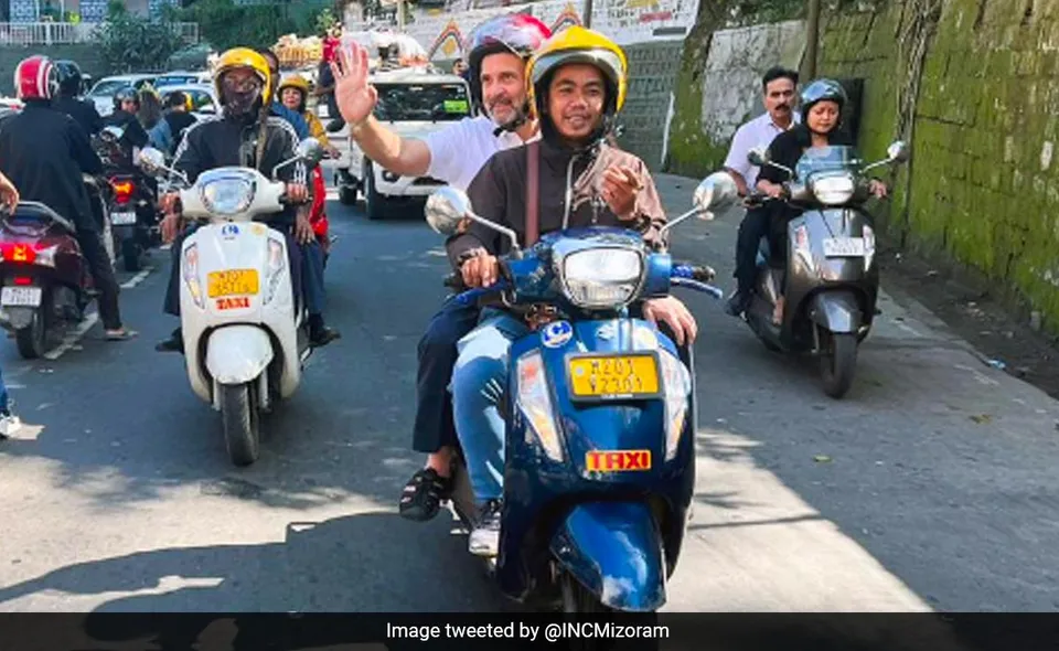 Rahul Gandhi rides pillion