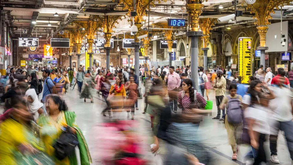 Commuters at the Chhatrapati Shivaji Maharaj Terminus (CSMT), in Mumbai