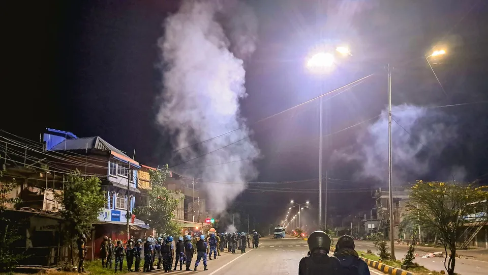 RAF and CRPF personnel guard after a mob tried to attack the ancestral house of Chief Minister N Biren Singh at Heingang in Imphal East district