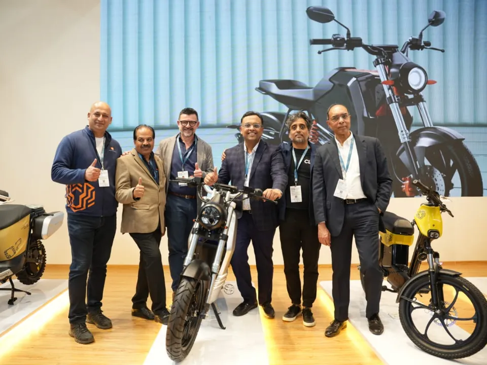 Tushar Choudhary, Founder & CEO Motovolt ( center) at the Auto Expo 2025.jpg