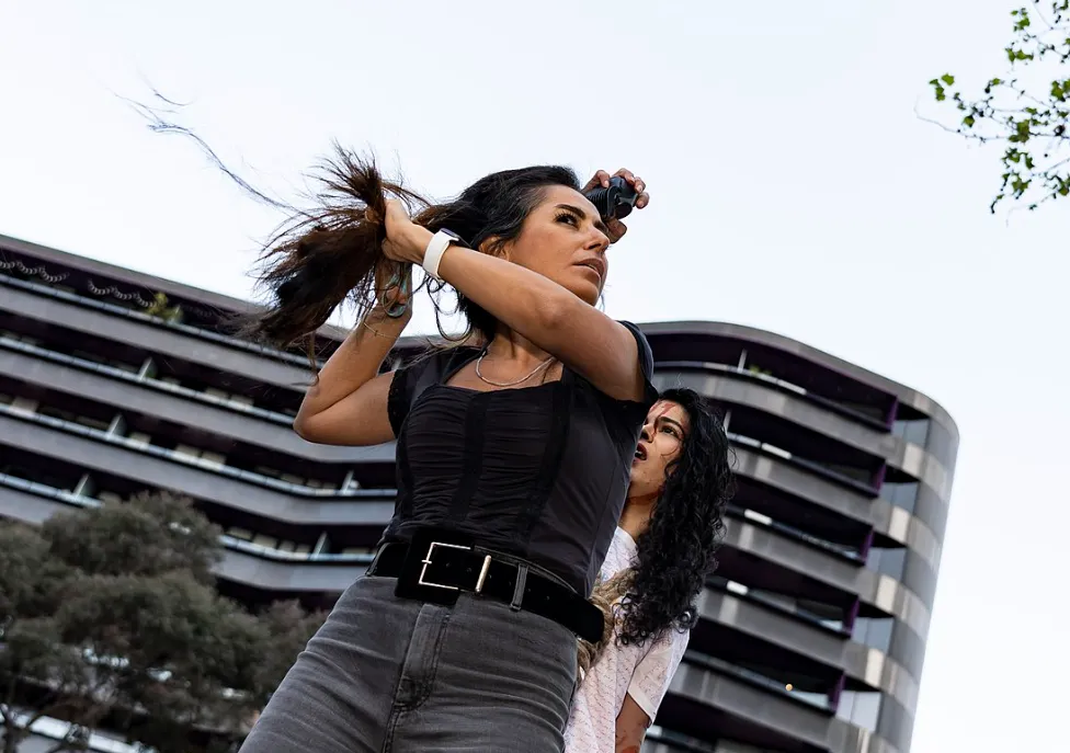 Women cutting their hair