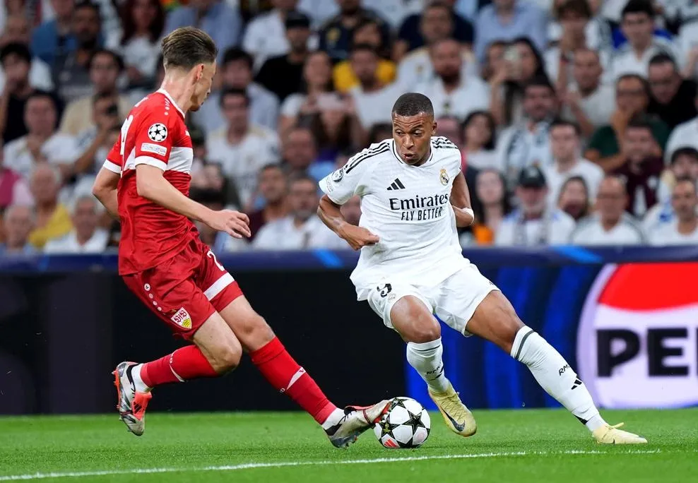 Kylian Mbappe in action | Real Madrid vs Stuttgart UCL 2024-25 Live Updates, Scores, News and Commentary - sportzpoint.com