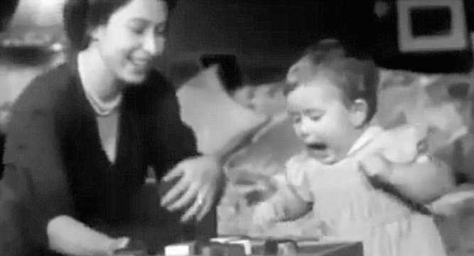 Queen Elizabeth playing with 1-year-old Prince Charles in new viral video