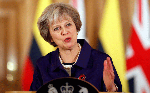 British PM May deems FIFAâ€™s opposition to poppy issue as outrageous